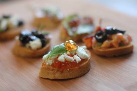 Gluten-Free Red Pepper Jelly Crostini with Goat Cheese and Basil